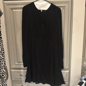 Size 12 long sleeve light fabric, Kate Spade dress and great condition.